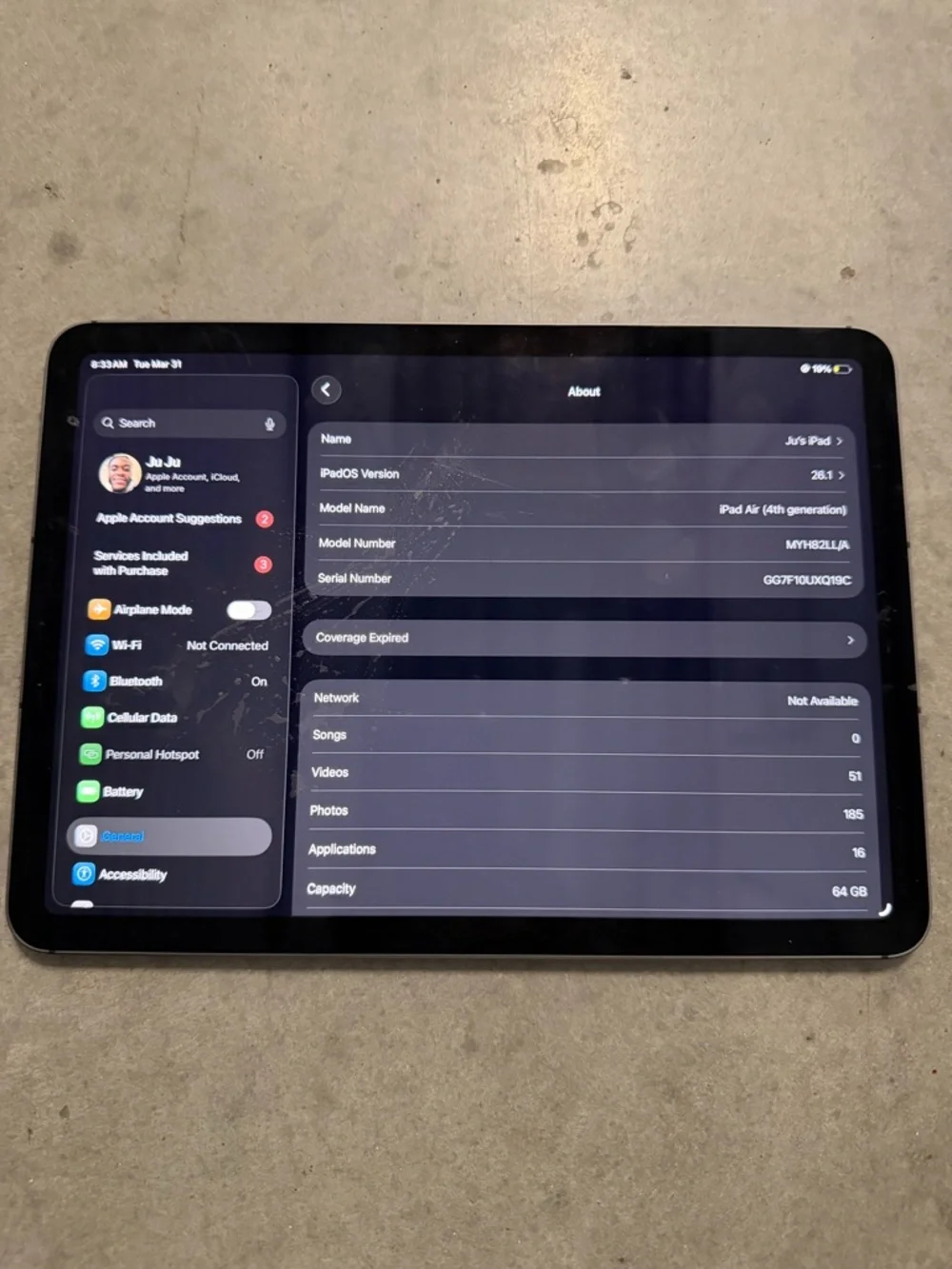 Apple Tablet in Black with Orange & Blue Team Wallpaper